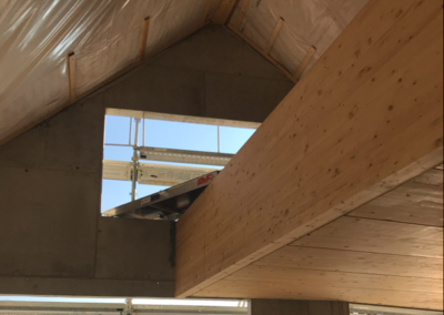 OVALE & Partenaires Ingénieur Civil - Immeuble Trolliet Corseaux - Mezzanine bois sur pignon en béton armé