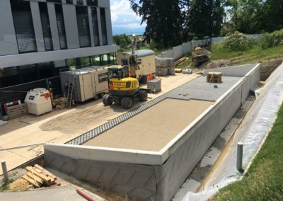 Adjonction de places de parc à un immeuble à Tolochenaz